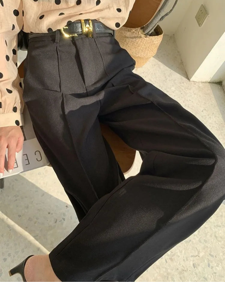 Pantalon Marjolaine noir femme, jambes larges et coupe sophistiquée.