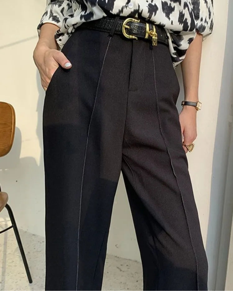 Pantalon Marjolaine noir femme, jambes larges et allure raffinée.