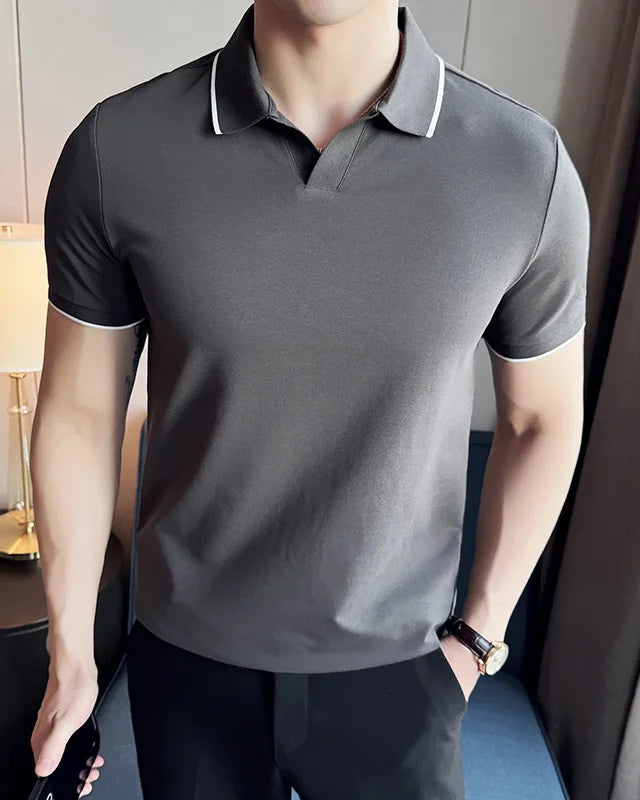 Polo Anas homme, gris, idéal pour un look sobre et élégant.