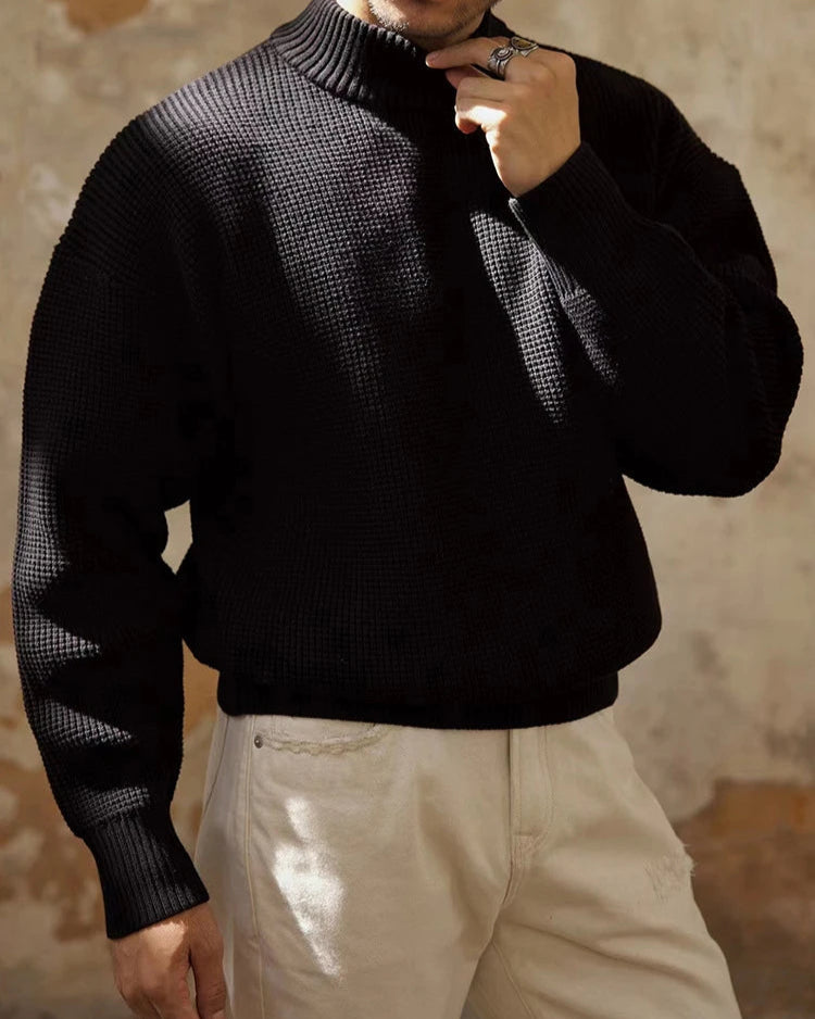 Pull Milo homme, noir, élégant et moderne avec col montant.