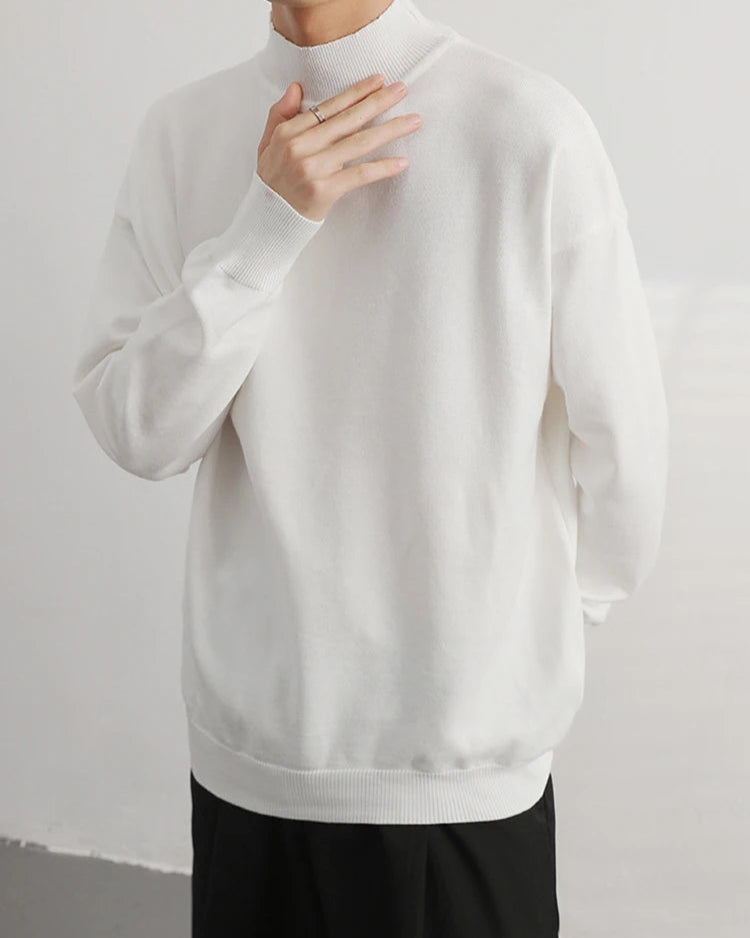 Pull Tristan blanc, parfait pour un look formel ou décontracté.